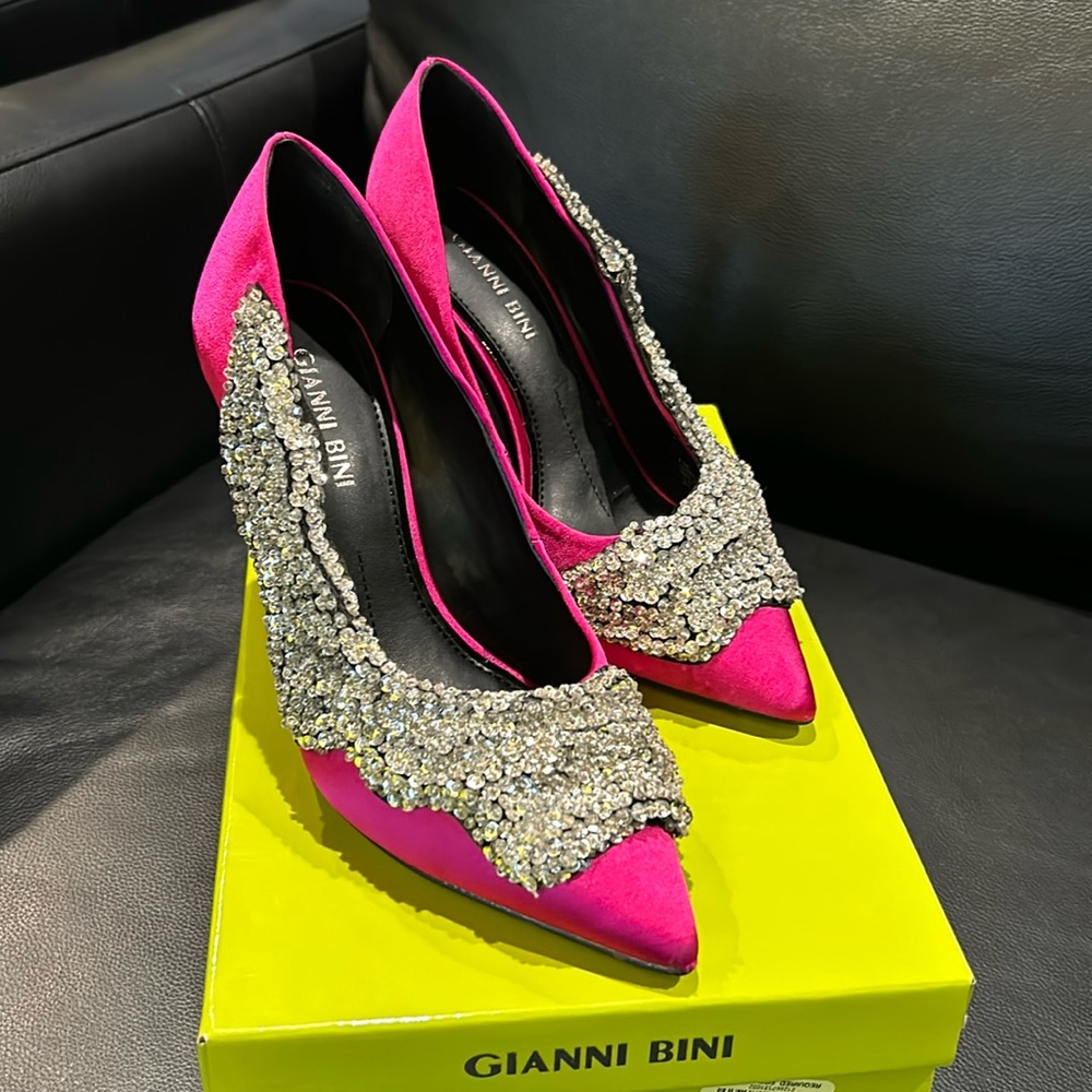 Gianni Bini pink pumps with side embellishment.